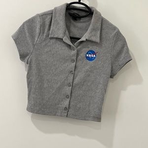 featuring an allover grey, front blue circle"NASA"  graphic